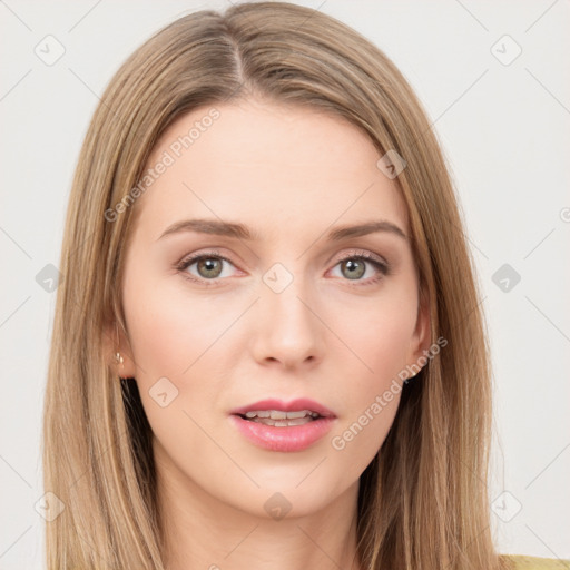 Neutral white young-adult female with long  brown hair and green eyes