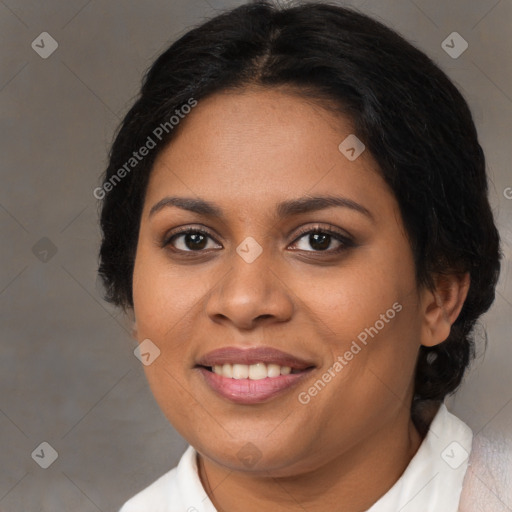 Joyful black young-adult female with medium  brown hair and brown eyes