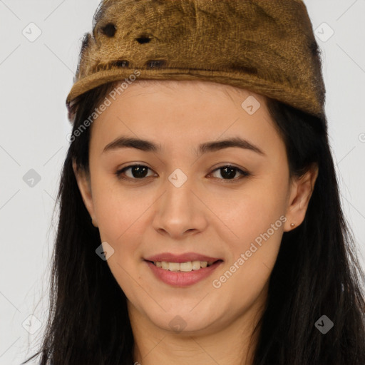 Joyful asian young-adult female with long  brown hair and brown eyes