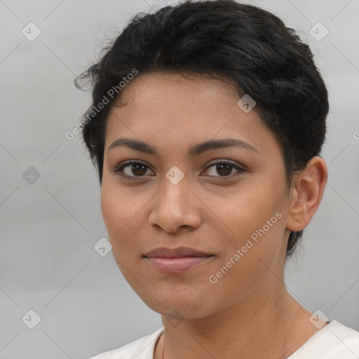 Joyful latino young-adult female with short  brown hair and brown eyes