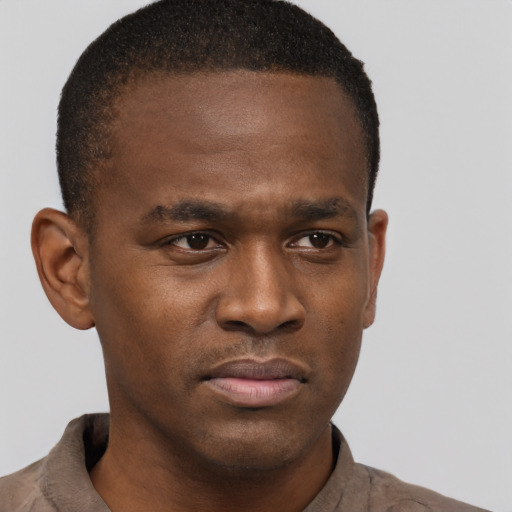 Neutral black young-adult male with short  brown hair and brown eyes