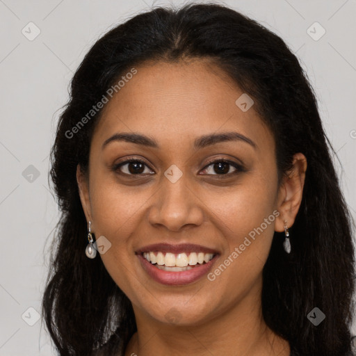 Joyful latino young-adult female with long  brown hair and brown eyes