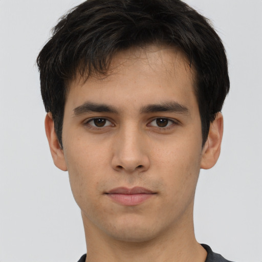Neutral asian young-adult male with short  brown hair and brown eyes