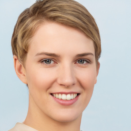 Joyful white young-adult female with short  brown hair and grey eyes