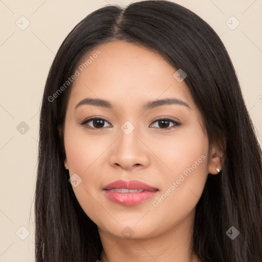 Joyful white young-adult female with long  black hair and brown eyes