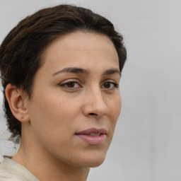 Neutral white young-adult female with short  brown hair and brown eyes