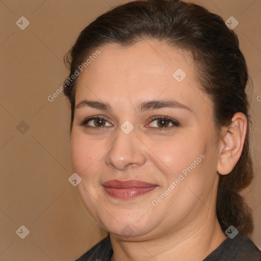 Joyful white adult female with medium  brown hair and brown eyes