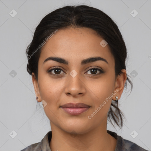 Joyful latino young-adult female with medium  brown hair and brown eyes