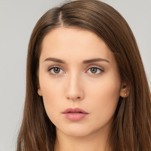 Neutral white young-adult female with long  brown hair and brown eyes