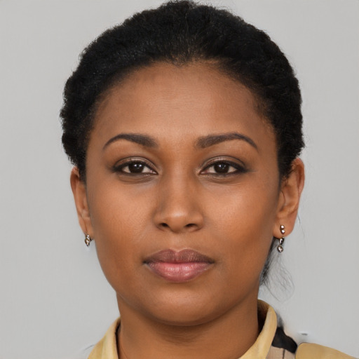 Neutral black young-adult female with short  brown hair and brown eyes