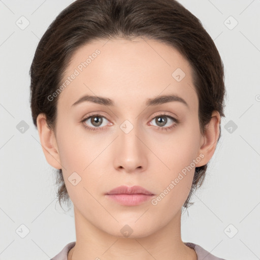 Neutral white young-adult female with medium  brown hair and brown eyes