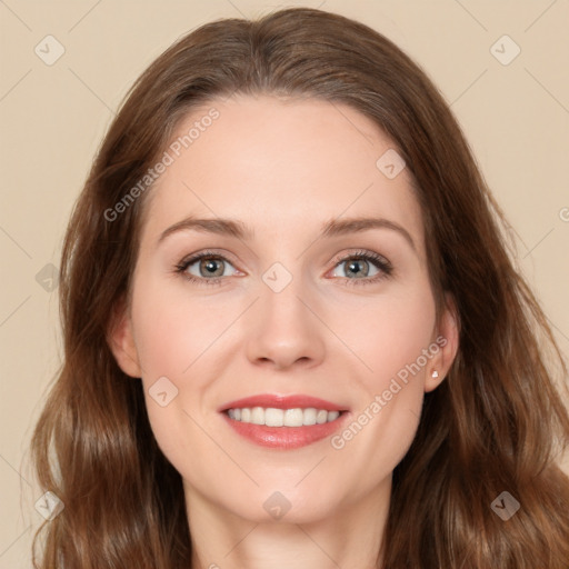 Joyful white young-adult female with long  brown hair and green eyes