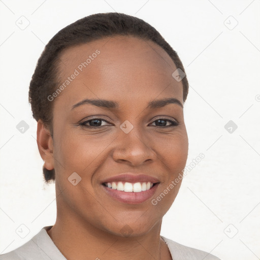 Joyful black young-adult female with short  brown hair and brown eyes