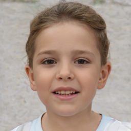 Joyful white child female with short  brown hair and brown eyes