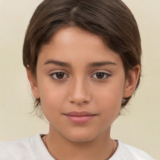 Joyful white child female with short  brown hair and brown eyes