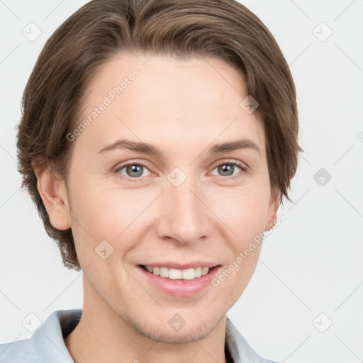 Joyful white young-adult female with short  brown hair and grey eyes