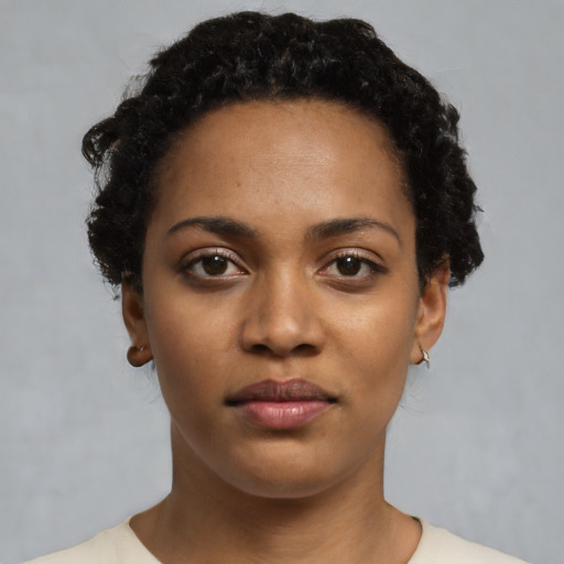 Neutral black young-adult female with short  black hair and brown eyes