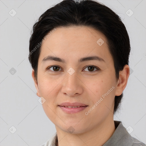 Joyful white young-adult female with medium  brown hair and brown eyes