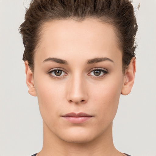 Neutral white young-adult female with short  brown hair and brown eyes