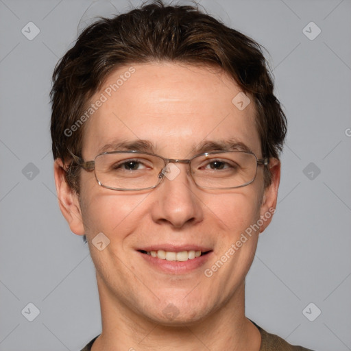 Joyful white adult male with short  brown hair and grey eyes