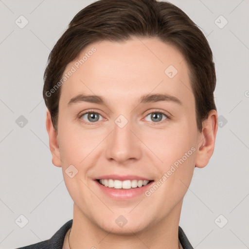 Joyful white young-adult female with short  brown hair and grey eyes