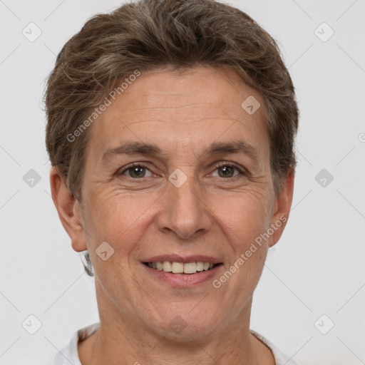 Joyful white adult female with short  brown hair and brown eyes