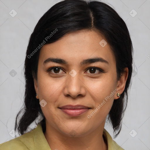 Joyful latino young-adult female with medium  brown hair and brown eyes