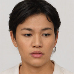 Neutral asian young-adult female with short  brown hair and brown eyes