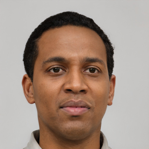 Neutral black young-adult male with short  black hair and brown eyes