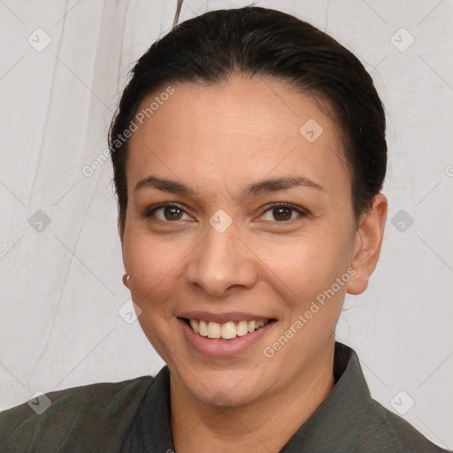 Joyful white adult female with short  brown hair and brown eyes