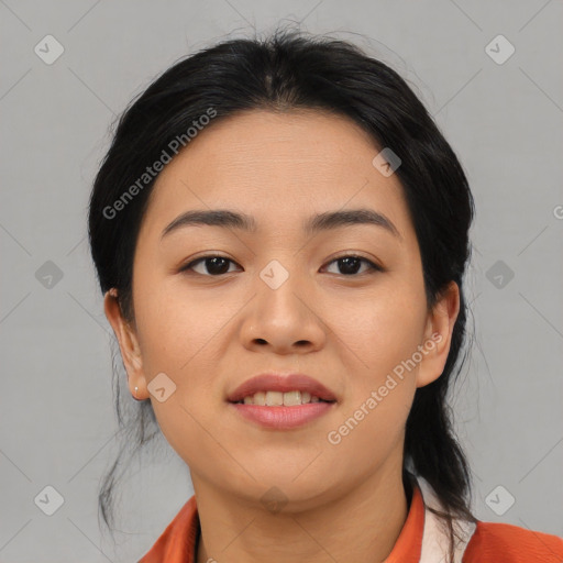 Joyful asian young-adult female with medium  black hair and brown eyes