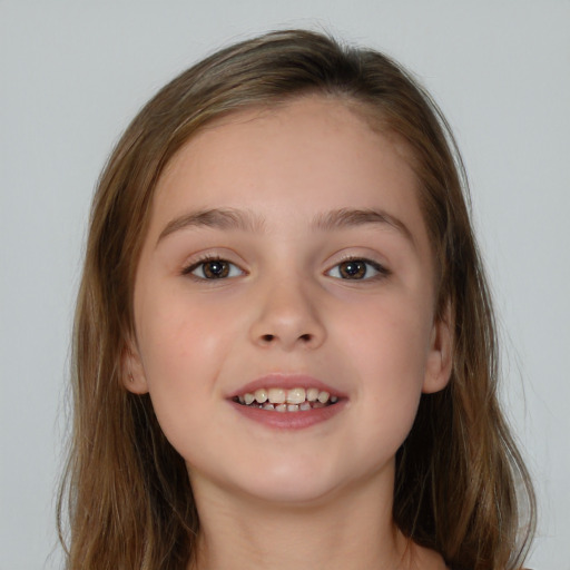 Joyful white child female with long  brown hair and brown eyes