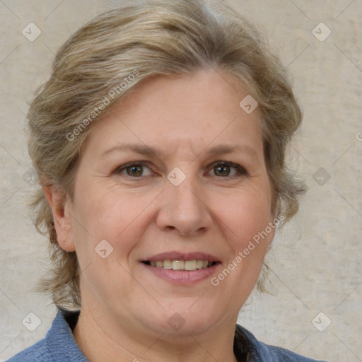 Joyful white adult female with medium  brown hair and blue eyes