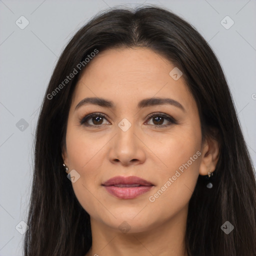 Joyful latino young-adult female with long  brown hair and brown eyes