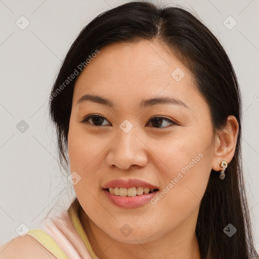 Joyful asian young-adult female with long  brown hair and brown eyes