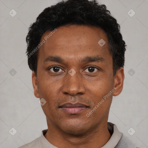 Neutral latino adult male with short  black hair and brown eyes
