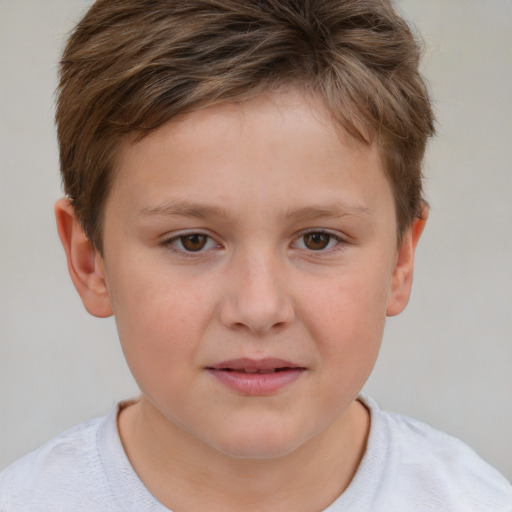 Joyful white child male with short  brown hair and brown eyes