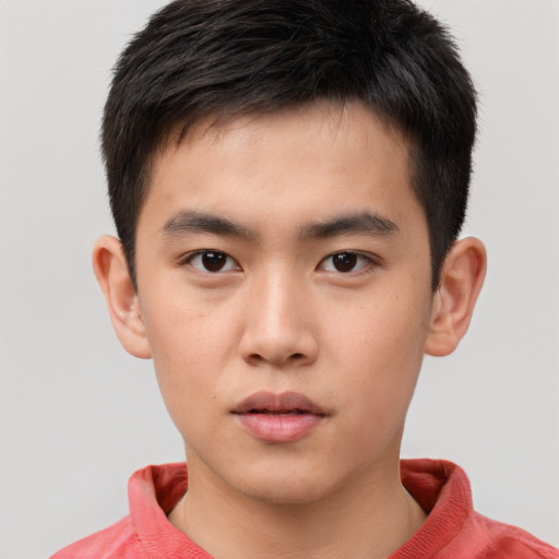 Neutral asian child male with short  brown hair and brown eyes