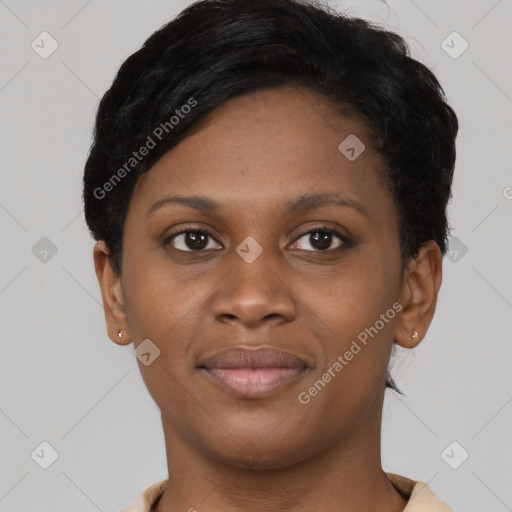 Joyful black young-adult female with short  brown hair and brown eyes