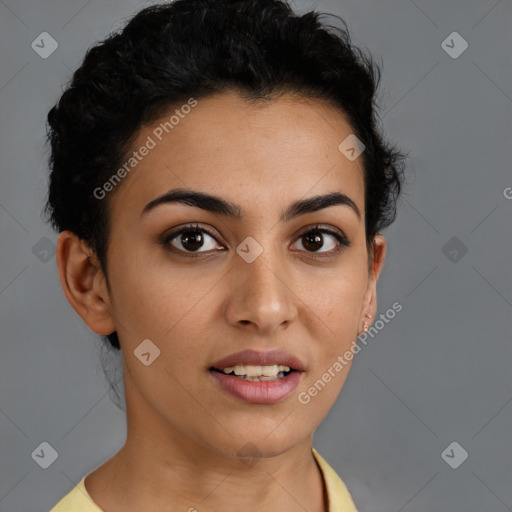 Joyful latino young-adult female with short  brown hair and brown eyes