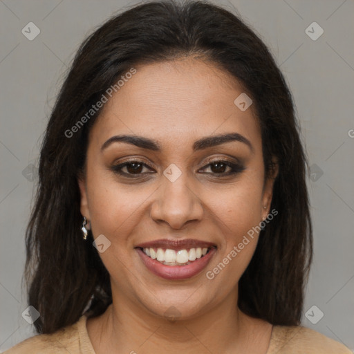 Joyful latino young-adult female with medium  brown hair and brown eyes