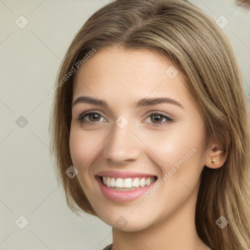 Joyful white young-adult female with long  brown hair and green eyes