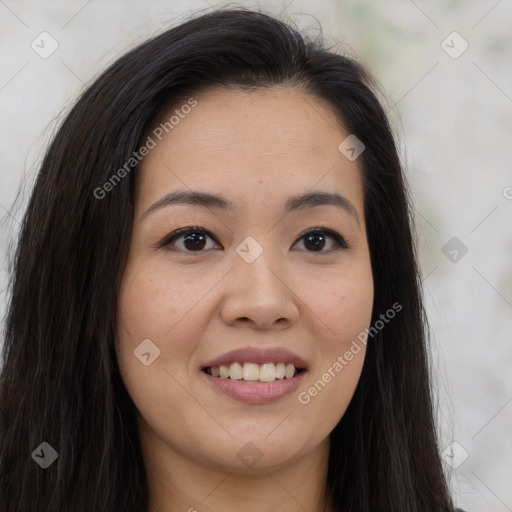 Joyful asian young-adult female with long  brown hair and brown eyes