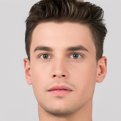 Neutral white young-adult male with short  brown hair and brown eyes