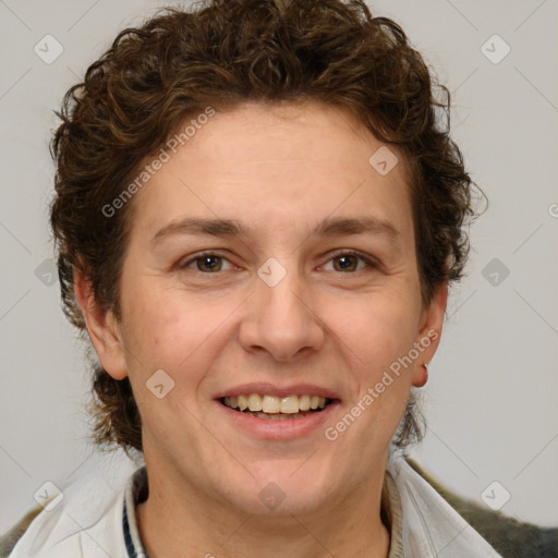 Joyful white adult female with short  brown hair and brown eyes