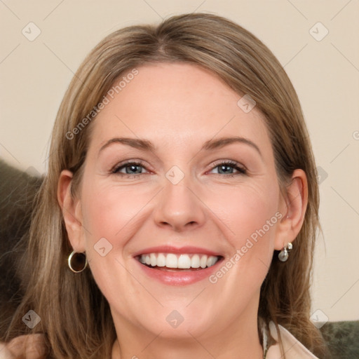 Joyful white adult female with medium  brown hair and grey eyes