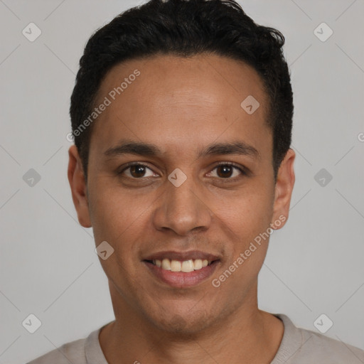 Joyful latino young-adult male with short  black hair and brown eyes