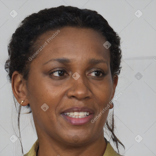 Joyful black adult female with short  brown hair and brown eyes