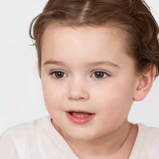 Joyful white child female with short  brown hair and brown eyes