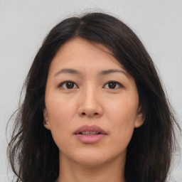 Neutral asian young-adult female with long  brown hair and brown eyes